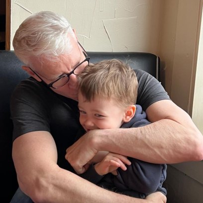 Anderson Cooper kisses son Wyatt on the head