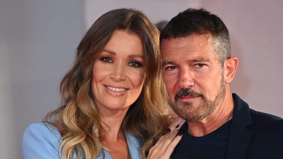 Antonio Banderas and Nicole Kimpel embrace on red carpet