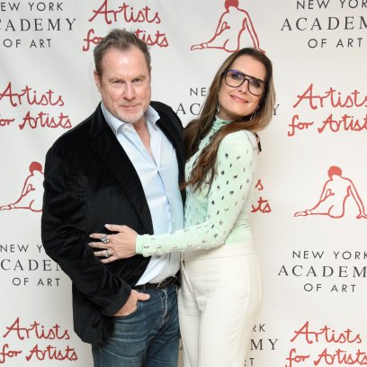 Brooke Shields wears glasses and embraces husband Chris Henchy