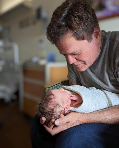 Donny Osmond holds newborn grandson Dune in hospital