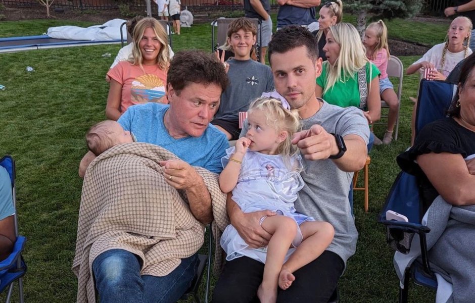 Donny Osmond sits inc hair with son Chris Osmond and his two kids Aussie and Dune