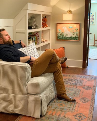 Ben Napier sits in his daughters' room inside their vacation home