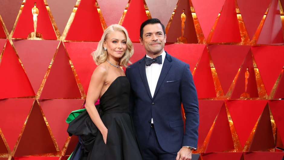 Kelly Ripa wears black gown next to suit-clad Mark Consuelos