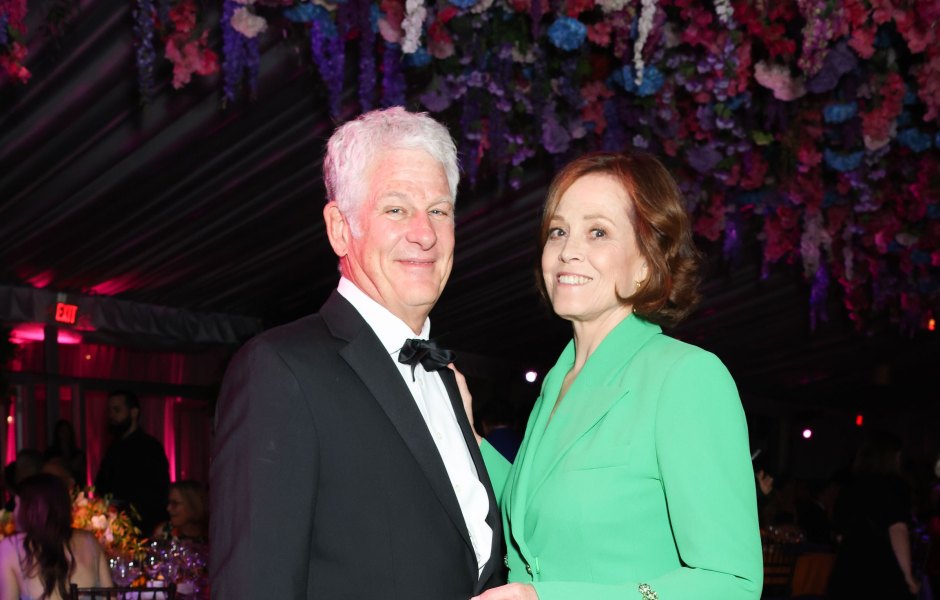 Sigourney Weaver wears green pantsuit next to husband Jim Simpson