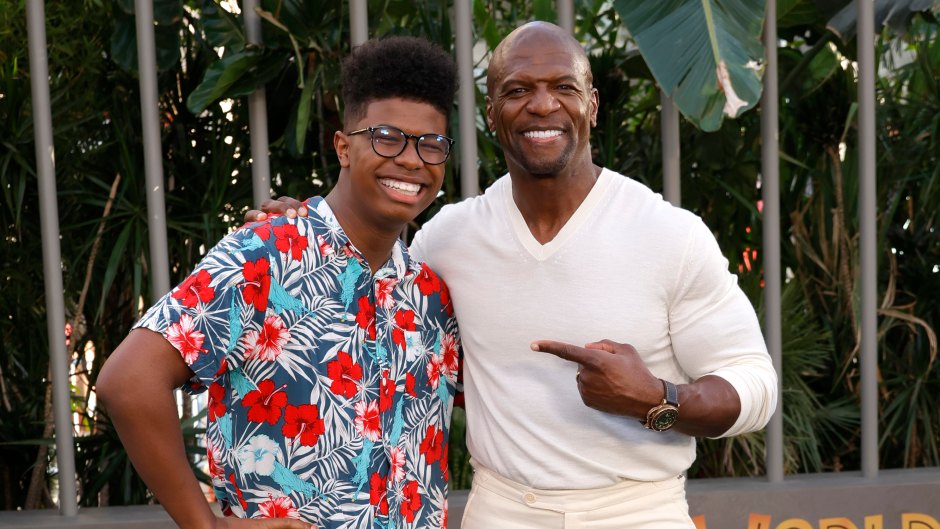 Terry Crews wears white outfit during appearance with son Isaiah