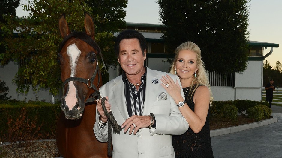Wayne Newton and wife Kathleen McCrone pose with a horse
