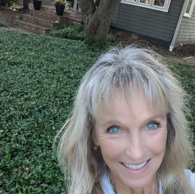 Karen E. Laine wears tank top in selfie