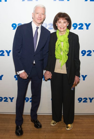 Anderson Cooper and Gloria Vanderbilt hold hands as they attend A Conversation With Anderson Cooper And Gloria Vanderbilt
