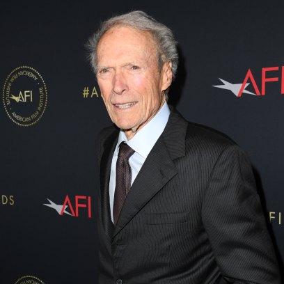 Clint Eastwood wears black suit on red carpet