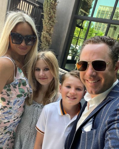 Jay McGraw and wife Erica pose with kids Avery and London