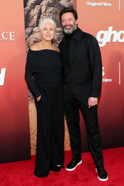 Hugh Jackman and wife Deborra-Lee Furness wear black outfits while posing together on red carpet