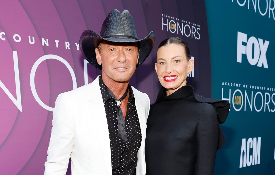 Tim McGraw wears white suit with black shirt and Faith Hill wears black drss with black boots