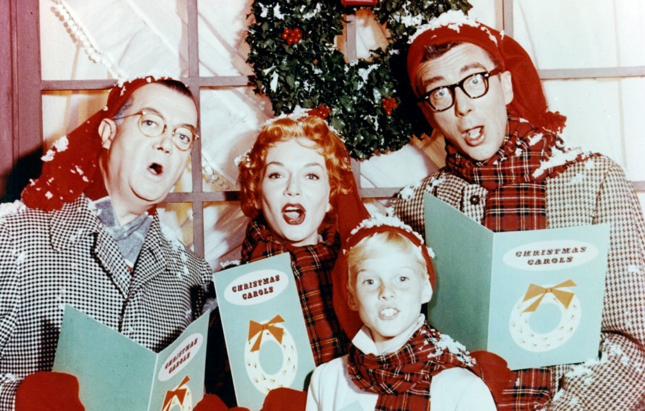 The cast of 'Dennis the Menace' wearing Christmas outfits