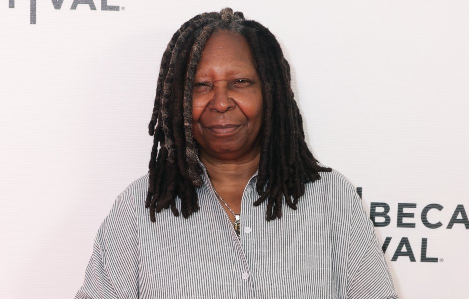 Whoopi Goldberg wears button-down shirt and holds sunglasses in her hand