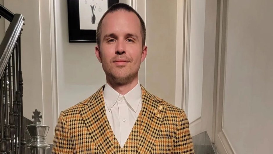 William Starsiak wears yellow suit with plaid pattern