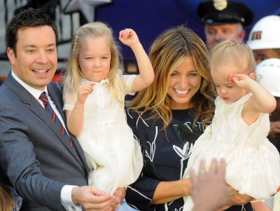 Jimmy Fallon holds daughters with wife Nancy Juvonen