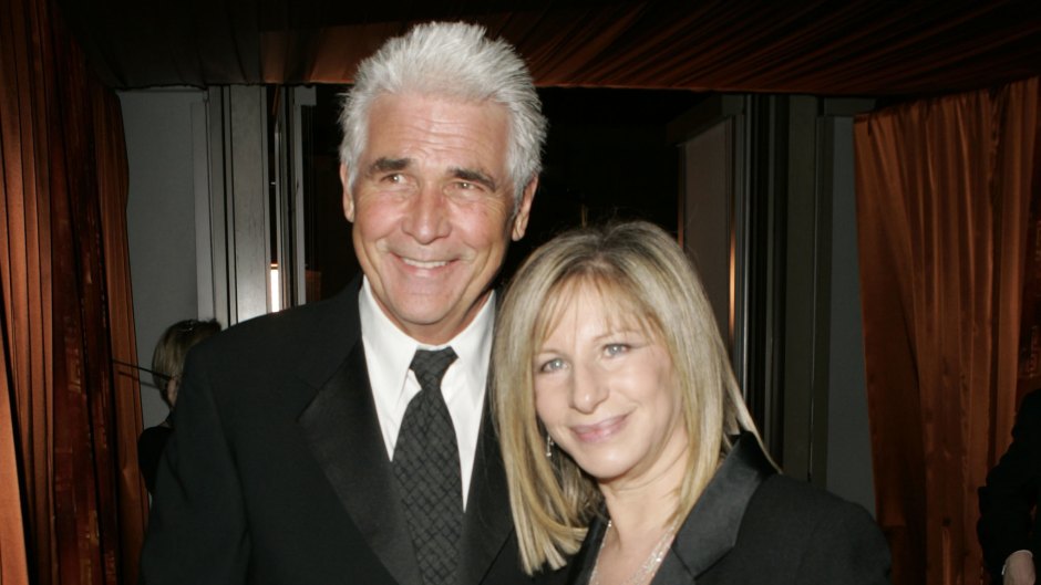 James Brolin and Barbra Streisand stand side by side in black outfits
