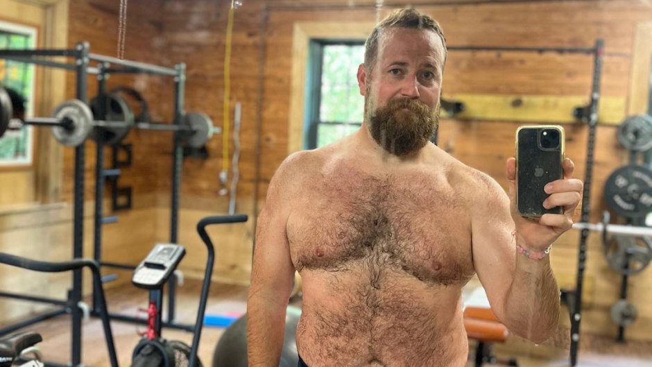 Ben Napier poses for selfie while shirtless in home gym