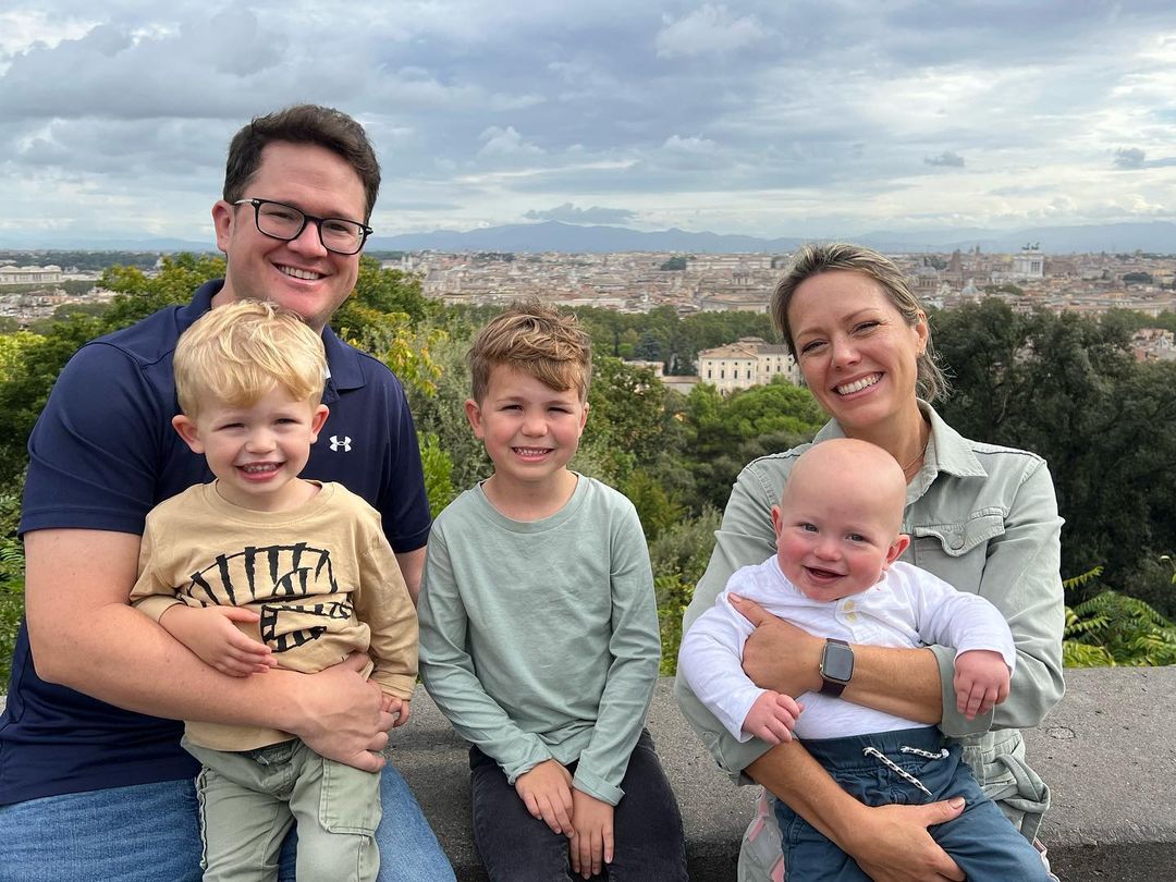 Dylan Dreyer and Brian Fichera sit with three sons