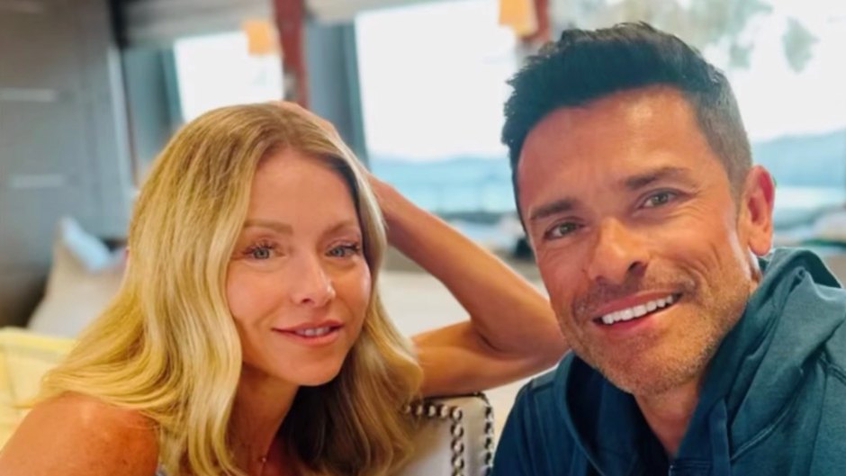 Kelly Ripa sits next to Mark Consuelos on couch