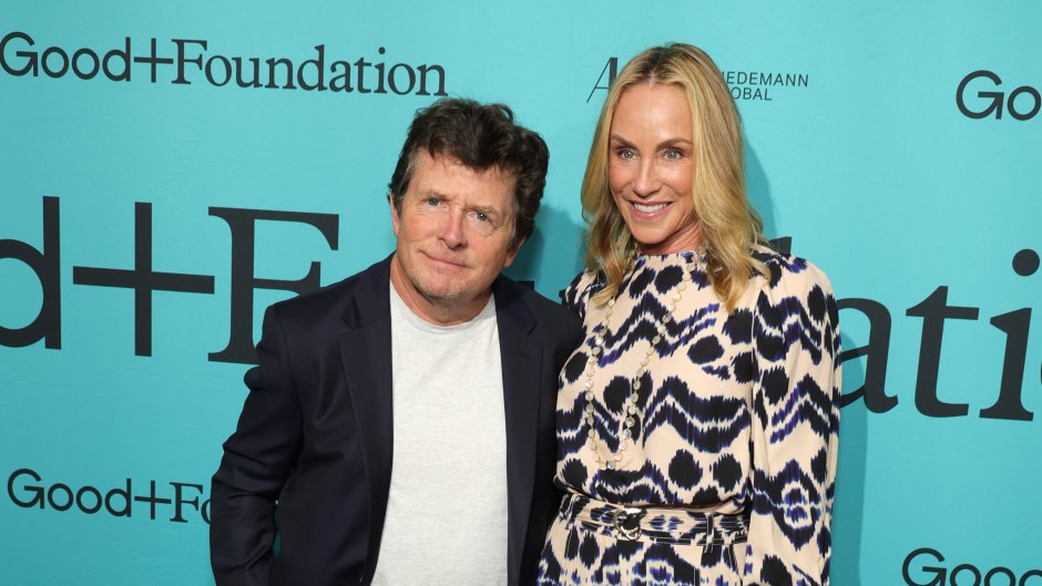 Tracy Pollan stands next to husband Michael J. Fox