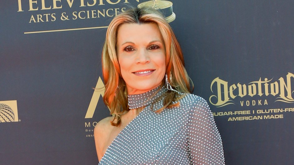 Vanna White wears a one-shoulder glitter gown in silver