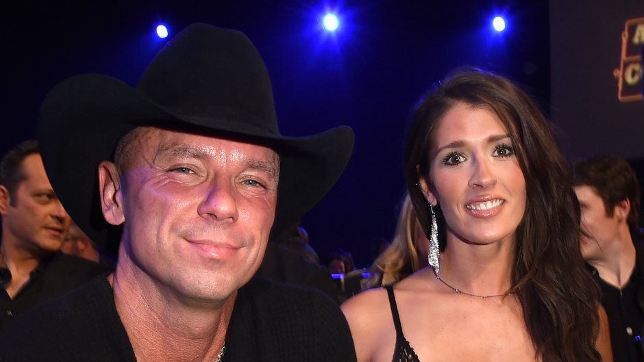 Kenny Chesney and Mary Nolan sit together in audience at awards show