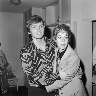 Bob Mackie embraces actor and comedian Carol Burnett