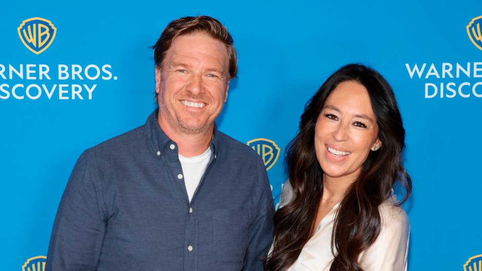 Joanna Gaines holds onto husband Chip Gaines' arm