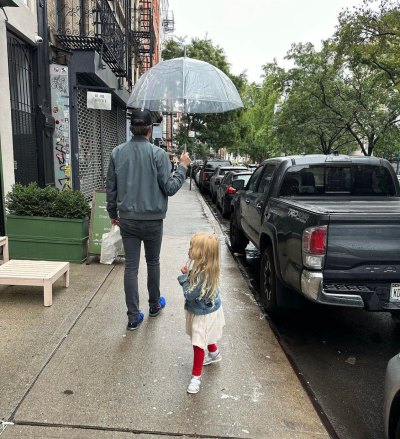 Rebecca Jarvis' daughter walks on sidewalk