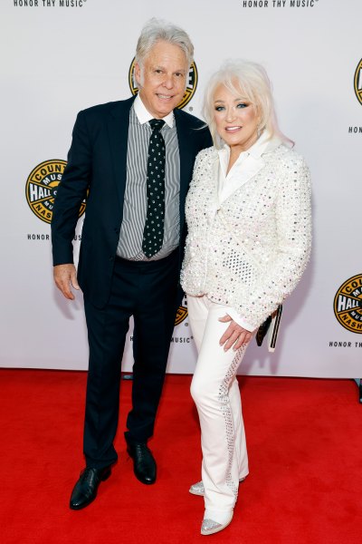 Tanya Tucker wears white outfit while posing with boyfriend Craig Dillingham