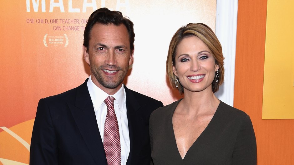 Amy Robach wears short green dress next to Andrew Shue
