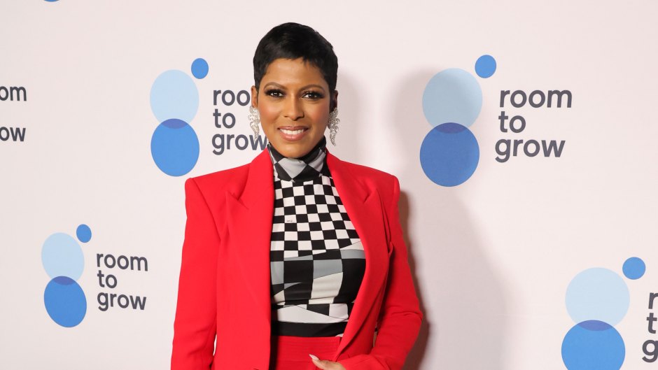 Tamron Hall wears red pantsuit with black and white shirt