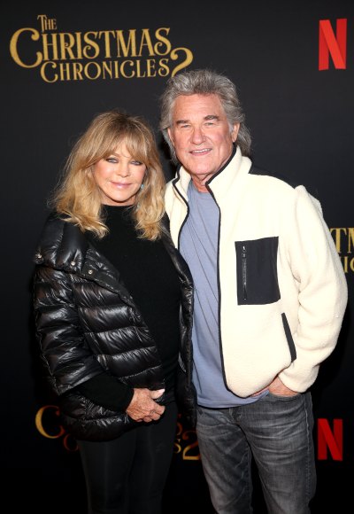 Goldie Hawn and Kurt Russell pose together at film premiere