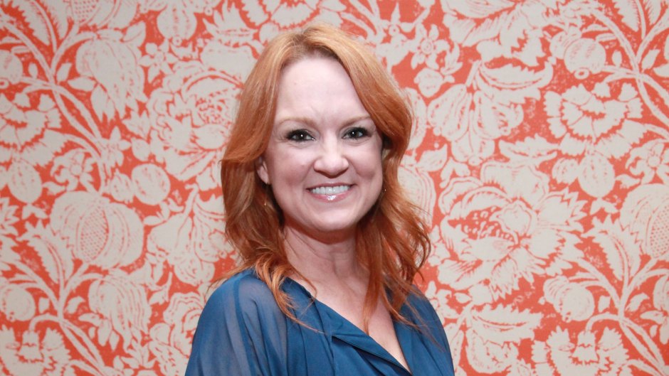 Ree Drummond smiles while wearing a blue shirt and jeans