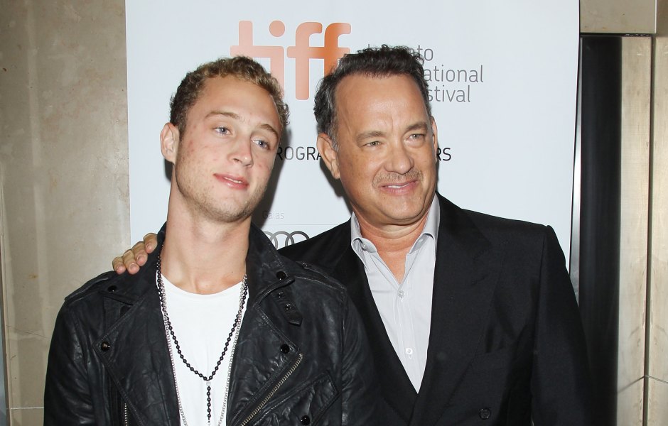 Tom Hanks poses with son Chet Hanks in suit