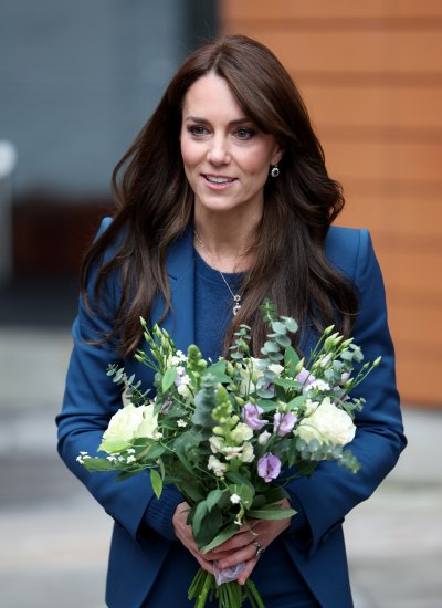 Kate Middleton holds a bouquet of flowers