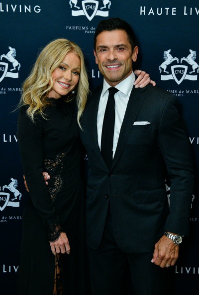 Kelly Ripa and Mark Consuelos smile on red carpet
