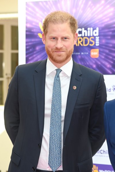 Prince Harry wears suit jacket with blue tie
