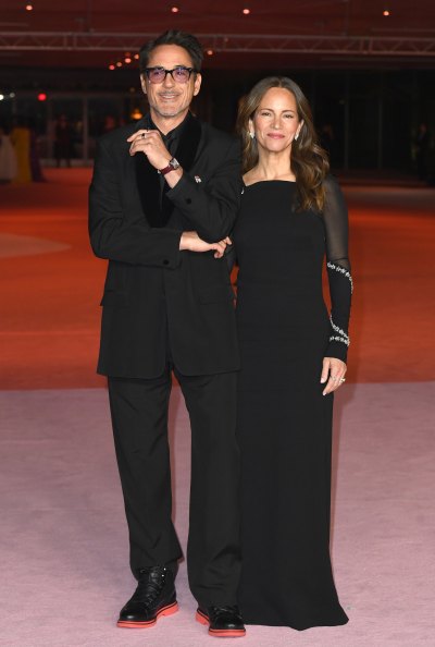 Robert Downey Jr. and wife Susan Downey wearing black outfits 