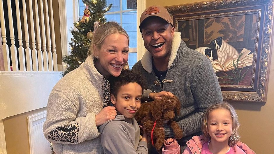 Craig Melvin poses with new puppy and wife and kids
