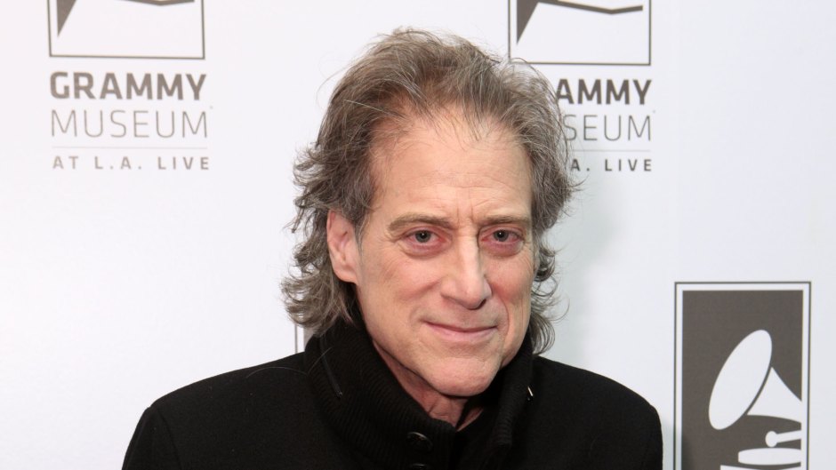 Richard Lewis in a black outfit