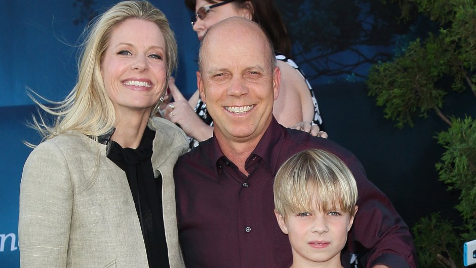 Scott Hamilton and wife Tracie pose with son