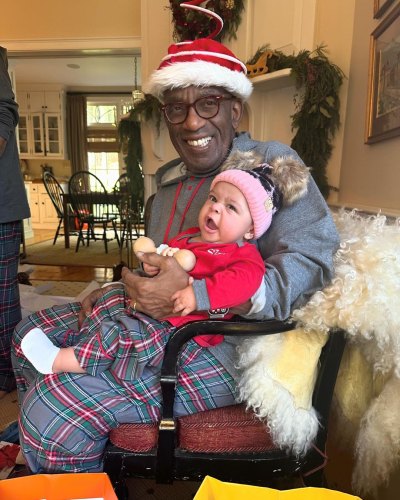Al Roker holding his granddaughter at home
