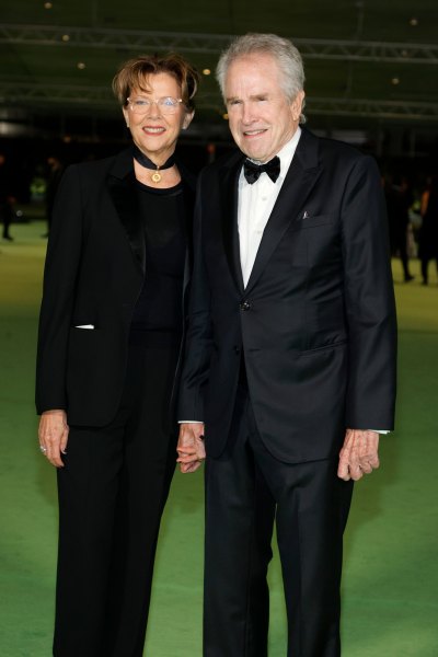 Annette Bening and Warren Beatty hold hands