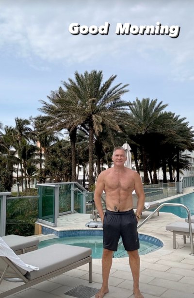 Sam Champion shirtless by the pool 